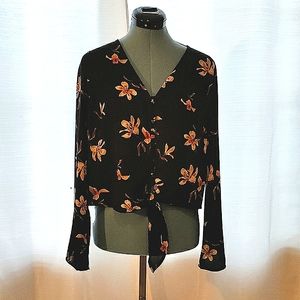Sheer front tie flower print Top. Great condition barely worn size small.